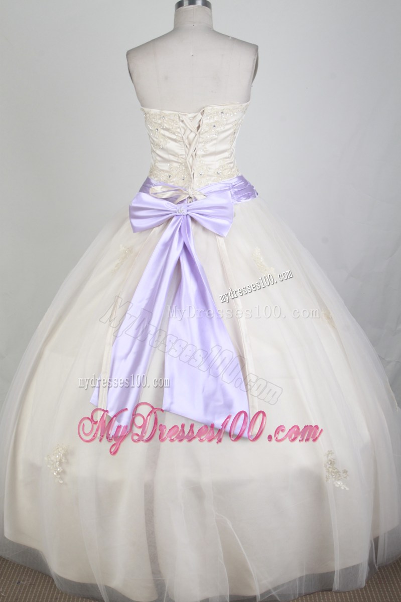 Cream Colored Tulle Quinceanera Dress with Lilac Bowknot Sash